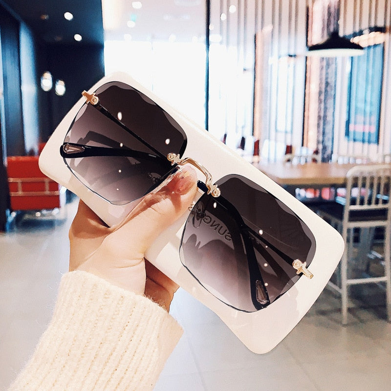 New Refined Rimless Cut Square Sunglasses for Women Fashion Personality Two-Color Sunglasses Web Celebrity the Same Trend Glasses.