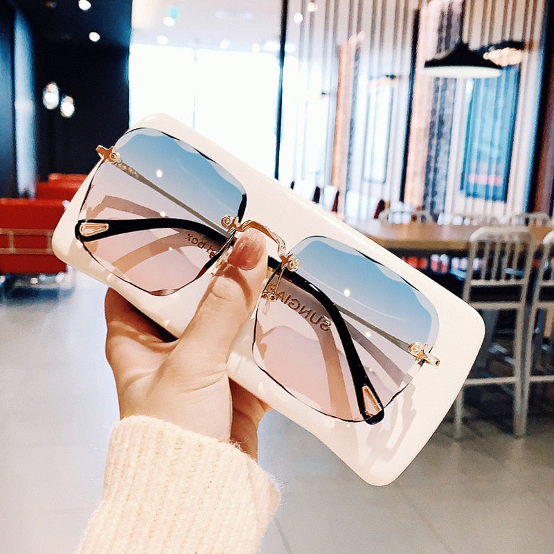 New Refined Rimless Cut Square Sunglasses for Women Fashion Personality Two-Color Sunglasses Web Celebrity the Same Trend Glasses.